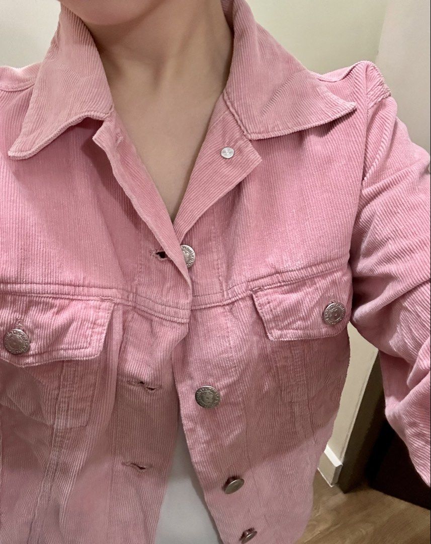 Pink Corduroy Jacket (Category: Coats, Jackets and Outerwear) located in Las Pinas. Submitted by petiteclothes_2000 (Listing ID 1461190881, Image 2). Description: - Adorable pink corduroy jacket - Classic button-up design - Features two convenient chest pockets - Versatile for layering over tops or dresses - Comfortable and stylish for daily wear - Easily pairs with jeans or skirts - Adds a lovely pop of color to any outfit.