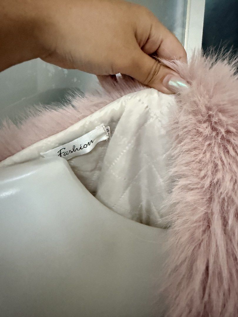 Pink Faux Fur Cropped Jacket (Category: Coats, Jackets and Outerwear) located in Manila. Submitted by vienayala295618 (Listing ID 1461242984, Image 2). Description: - Super soft pink faux fur - Cropped style, ideal for layering - Satin-like quilted lining inside - Brand: Fashion - Cozy and chic look - Perfect for nights out or adding flair to any outfit.