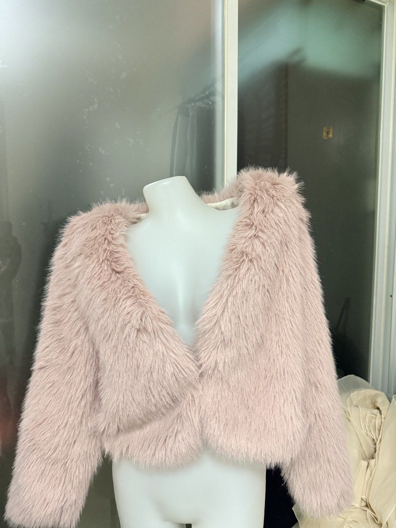 Pink Faux Fur Cropped Jacket (Category: Coats, Jackets and Outerwear) located in Manila. Submitted by vienayala295618 (Listing ID 1461242984, Image 1). Description: - Super soft pink faux fur - Cropped style, ideal for layering - Satin-like quilted lining inside - Brand: Fashion - Cozy and chic look - Perfect for nights out or adding flair to any outfit.