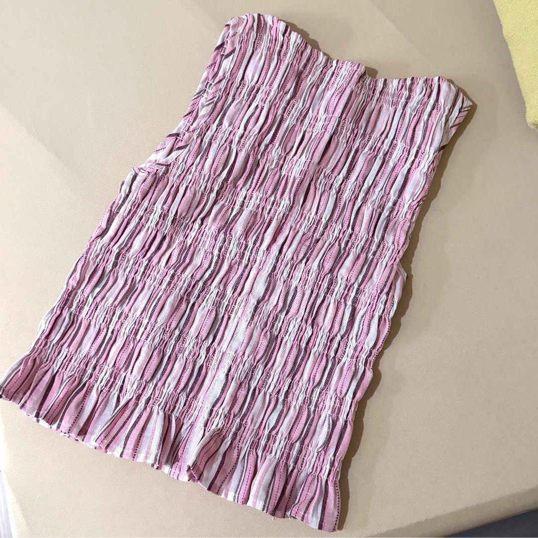 Pink Striped Smocked Top (Category: Sleeveless) located in Antipolo. Submitted by elmclothing (Listing ID 1461231877, Image 1). Description: - Cute pink and white striped tube top - Smocked all over for a stretchy fit - Likely fits size Small to Medium - Ideal for summer wear or layering - Never been worn.