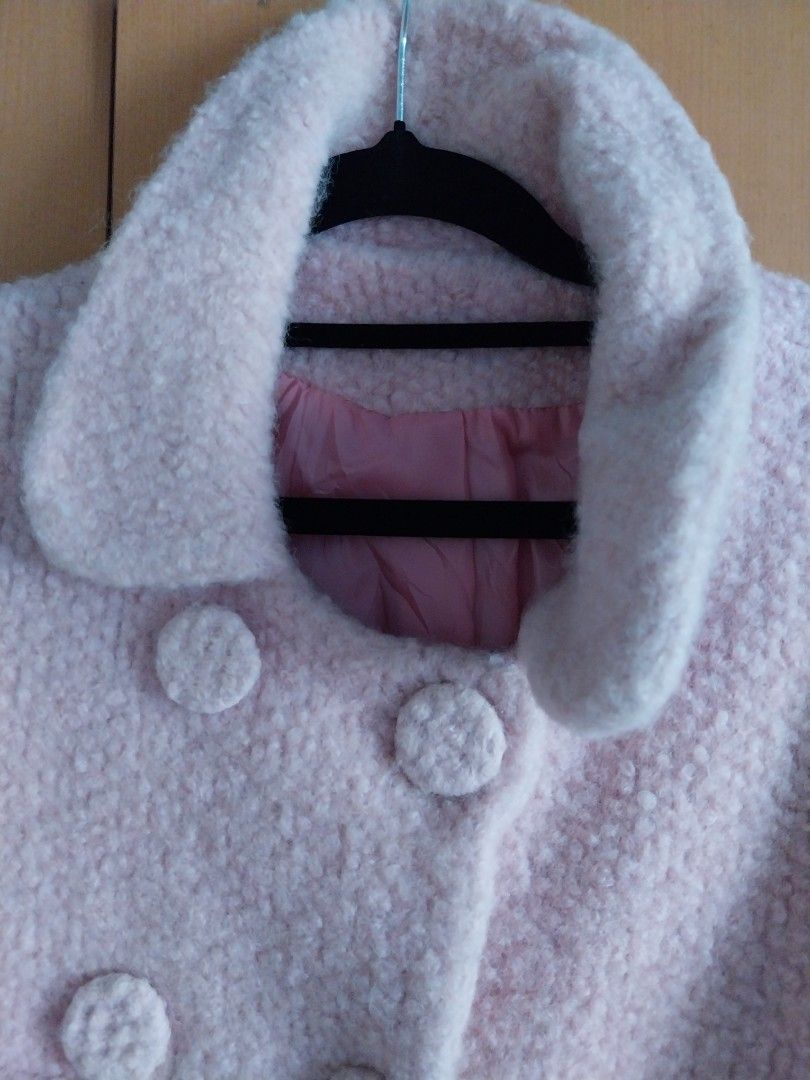 Pink Textured Double-Breasted Coat (Category: Coats, Jackets and Outerwear) located in Cavite. Submitted by angelistuff (Listing ID 1461130770, Image 2). Description: - Cute pink textured coat - Double-breasted front with button closures - Two front pockets - Warm and cozy feel - Small stain on the right sleeve cuff - Ideal for cooler weather.
