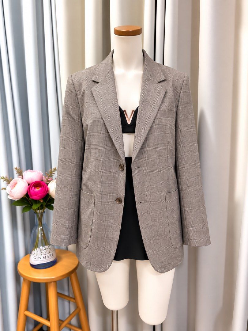Plaid Tan Beige Blazer (Category: Coats, Jackets and Outerwear) located in Taguig. Submitted by vm.co (Listing ID 1461317383, Image 1). Description: Perfect for: • Corporate office wear • Business travel • Smart casual outfits • Rainy or cool weather • Capsule wardrobe • Everyday sophisticated styling Condition: Appears to be in very good preloved condition with no visible major stains, tears, or discoloration in the photo. A light steam will giv