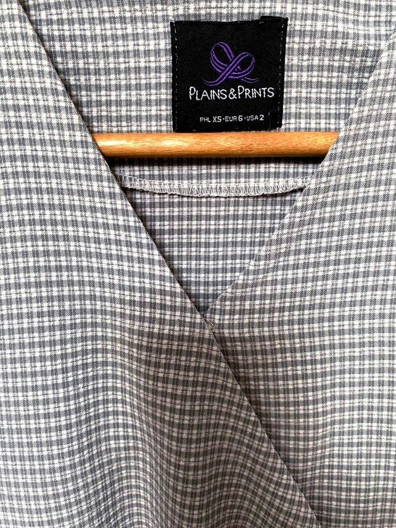 PLAINS & PRINTS Checked Wrap Top XS (Category: Blouses) located in Manila. Submitted by prettypink4 (Listing ID 1461275535, Image 1). Description: - Checked wrap top from PLAINS & PRINTS - Flattering V-neckline with adjustable tie waist - Stylish cuffed sleeves with - Versatile for casual outings or dressing up - Runs big can fit Small and medium frame.