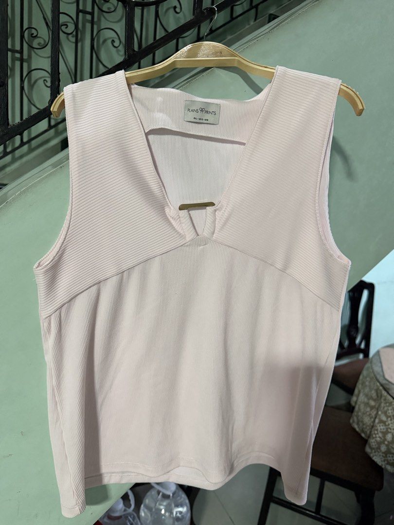 Plains & Prints Sleeveless Top - Light Pink (Category: Sleeveless) located in Pasig City. Submitted by aprilluxcloset0812 (Listing ID 1461322541, Image 1). Description: - Light pink sleeveless top - Brand: Plains & Prints - Ribbed texture all over - V-neck with gold ring detail - Simple and chic design - Versatile for layering or wearing on its own RFS: decluttering EVERYTHING MUST GO‼️Just make a reasonable offer ❤️ All items ON HAND, handled wi