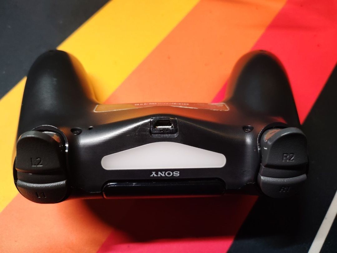 Playstation 4 Controller V2 (Refurbished) (Category: Controllers) located in Paranaque City. Submitted by adtobias (Listing ID 1461323419, Image 3). Description: PS4 Controller V2 (Refurbished) This is a refurbished controller, cleaned and repair back to it's original working state Repairs done: - Cleaned the shell, buttons and internal - Changed the thumbstick covers to grey - Changed the internal flex membrane to resolve ghost inputs - Changed 