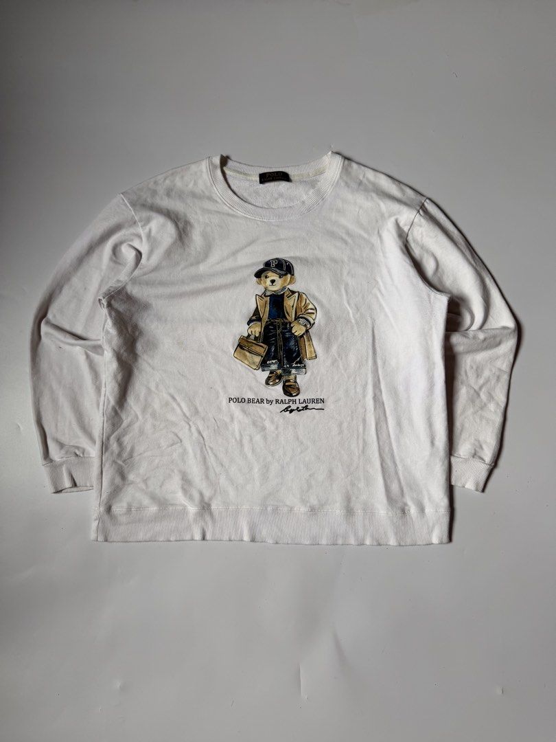 Polo Ralph Lauren Bear Crewneck White (Category: Coats, Jackets and Outerwear) located in Baguio. Submitted by themgarbage (Listing ID 1461256111, Image 1). Description: Size tagged: Issue:none Width:22 Length:24.5 Shoulder:19.5 Sleeves:21.