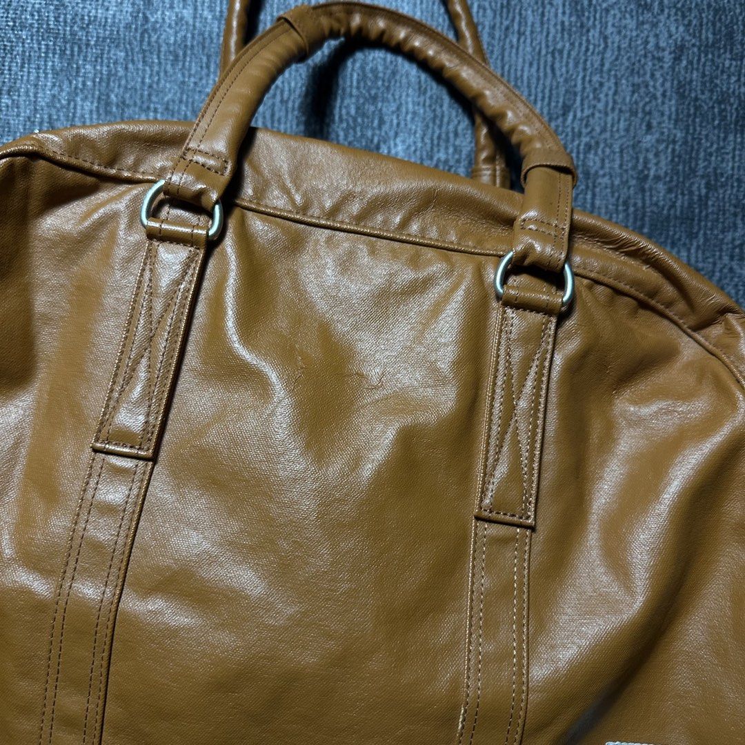 Porter Yoshida & Co. Brown Leather Boston Bag (Category: Luxury Bags & Wallets) located in Manila. Submitted by curatedragss (Listing ID 1461243410, Image 3). Description: - Authentic Porter Yoshida & Co. Tokyo Japan Boston Bag - Rich brown leather - Classic duffel style - Comfortable top handles - Convenient front pocket with snap closures - Secure top zipper closure - Ideal for weekend getaways or as a carry-on luggage.