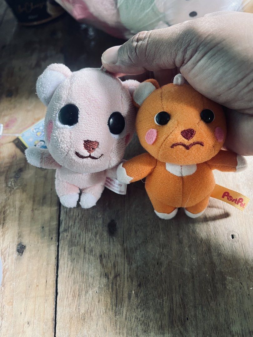 Postpet Plushies - Pink & Orange Bears (Category: Plushies & Soft Toys) located in Muntinlupa City. Submitted by joanofarc1013 (Listing ID 1461125418, Image 1). Description: - Adorable PonPet plush toys - Available in pink and orange - Features big eyes and little paws - Resembles cute little bears - Ideal for collectors or as a gift.