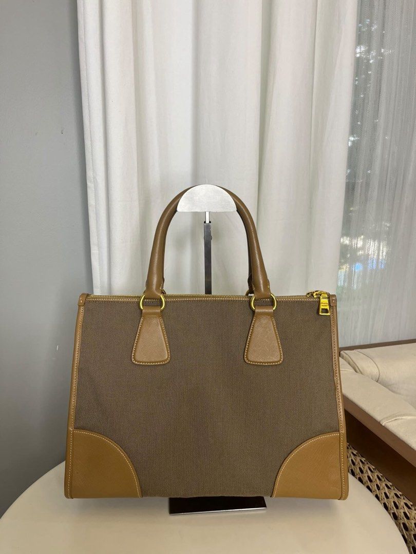 PRADA LUX JACQUARD (Category: Luxury Bags & Wallets) located in Taytay. Submitted by madamepean (Listing ID 1461196133, Image 2). Description: SELLING LOW!! Rare PRADA LUX JACQUARD Very beautiful and classy!! :) Beige/Brown color 10000000% Authentic Comes with Dustbag only.