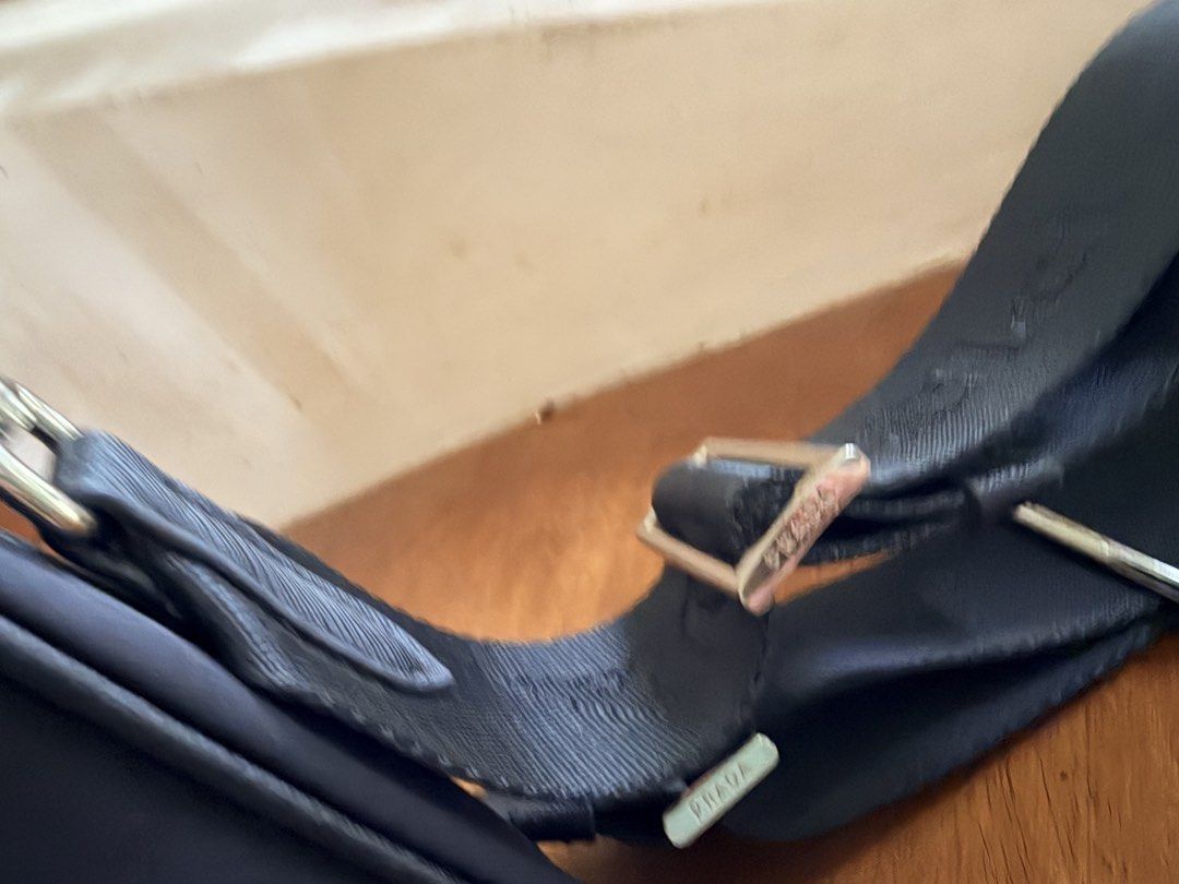 Prada nylon crossbody bag (Category: Announcements) located in San Pascual. Submitted by s3resale (Listing ID 1461202086, Image 3). Description: Missing metal strap Slight rubs s may hardware Flawless strap and body With black tag .