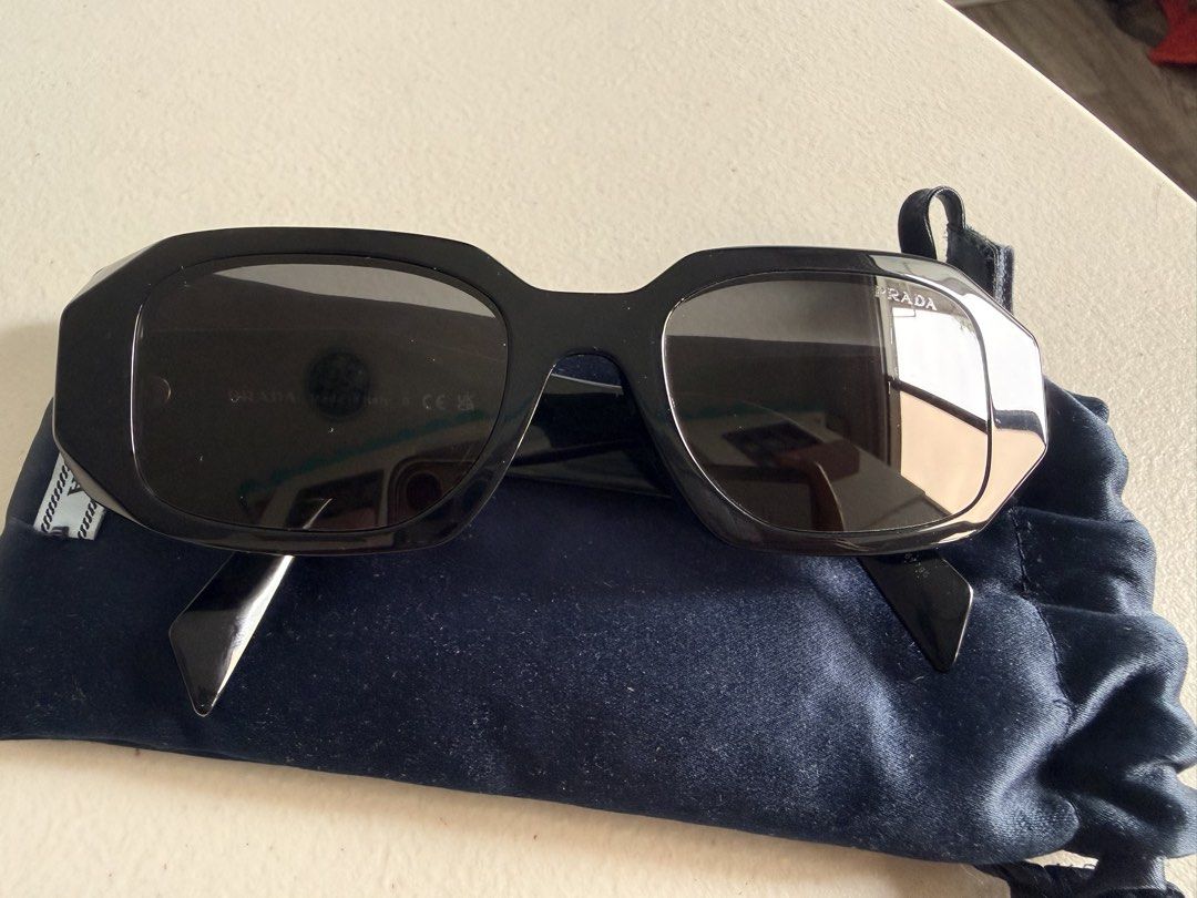 Prada rectangular Sunglasses Black PR 17WSF 1AB5S0 51-20 (Category: Sunglasses & Eyewear) located in Valenzuela. Submitted by dees.corner (Listing ID 1461148885, Image 1). Description: PR 17WSF 1AB5S0 51-20- Authentic Prada sunglasses With minimal hairline inside SIZE S (51-20) - Classic black frame with dark lenses - Comes with navy blue Prada pouch - Perfect for everyday wear - Selling as they are not frequently used.