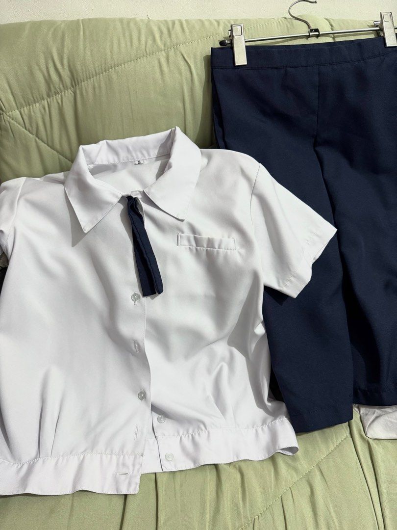 Preloved UST AB Type A Uniform Small (Category: Shirts) located in Manila. Submitted by carou84131 (Listing ID 1461139825, Image 2). Description: Faculty of Arts and Letters Type A uniform set 2 sets available, both skirts have a pocket. Polos have signs of usage (bleach stain on one by the front pocket).