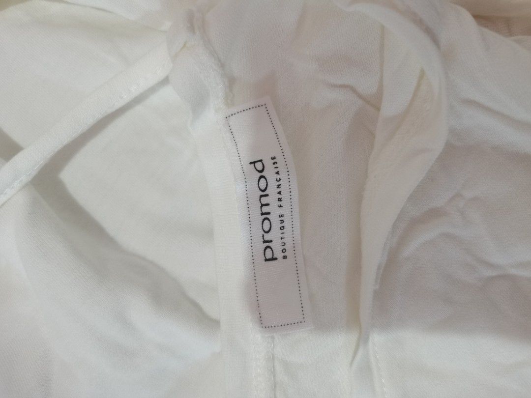 Promod White V-Neck Tie Back Top (Category: Blouses) located in Dipolog. Submitted by true.brclo_thing (Listing ID 1461237096, Image 2). Description: - Brand: Promod - Color: White - Neckline: V-neck with tie-back detail - Sleeves: Short sleeves - Hemline: Slightly curved - Style: Simple, versatile, easy to pair with any outfit - SIZE: L-XL - NO ISSUE 📌 .