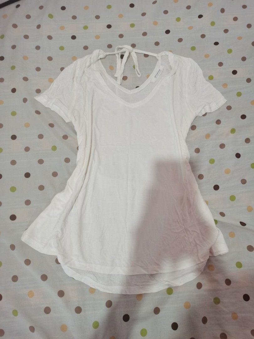 Promod White V-Neck Tie Back Top (Category: Blouses) located in Dipolog. Submitted by true.brclo_thing (Listing ID 1461237096, Image 1). Description: - Brand: Promod - Color: White - Neckline: V-neck with tie-back detail - Sleeves: Short sleeves - Hemline: Slightly curved - Style: Simple, versatile, easy to pair with any outfit - SIZE: L-XL - NO ISSUE 📌 .
