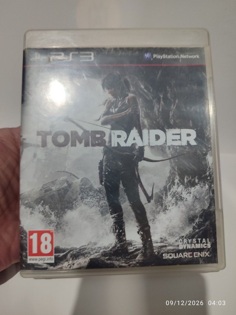 PS3 - Tomb Raider (PRE-OWNED) "EU" (Category: PlayStation) located in Mendez-Nunez. Submitted by sf2_gameshop (Listing ID 1461225500, Image 2). Description: PLEASE READ CONDITION: A pre-owned item. Installed and tested working. Its cover art has a portion that it was peeled off, but not affecting the gameplay. It comes with the game manual and insert. The back case has dents - pls. see posted photo. GENRE: Action-adventure MODE: Single-player REG