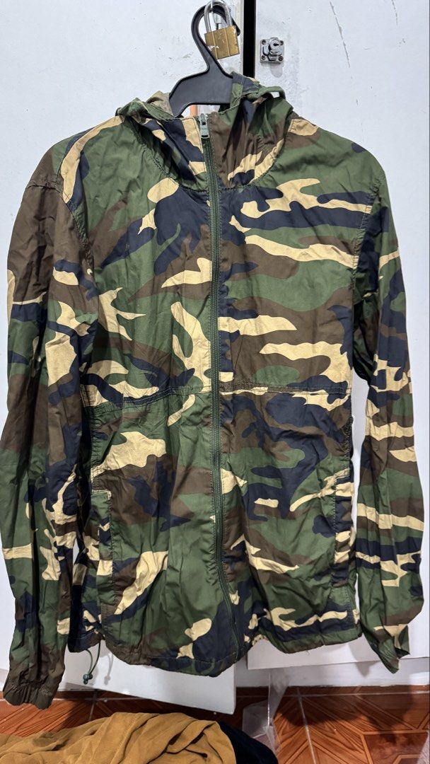 Pull & Bear Camouflage Hooded Jacket L/40 (Category: Coats, Jackets and Outerwear) located in Zamboanga. Submitted by raniee19 (Listing ID 1461243301, Image 1). Description: - Pull & Bear Camouflage Hooded Jacket - Size: L / 40 - Lightweight material, ideal for layering - Features a full zip front and convenient pockets - Versatile for casual wear or outdoor adventures.