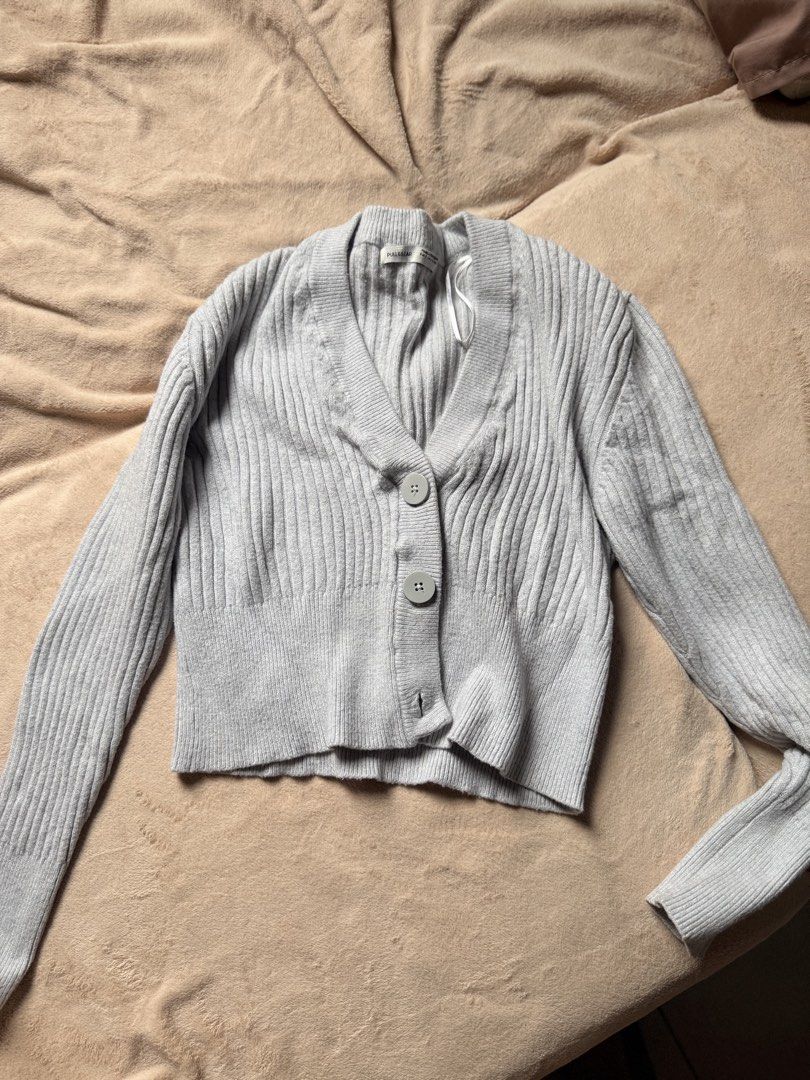 Pull & Bear Grey Ribbed Button-Up Cropped Cardigan (Category: Coats, Jackets and Outerwear) located in Manila. Submitted by jvee_05 (Listing ID 1461160083, Image 1). Description: Grey ribbed cardigan from Pull & Bear - Cropped fit and button-up front - no flaws rfs: maliit na .