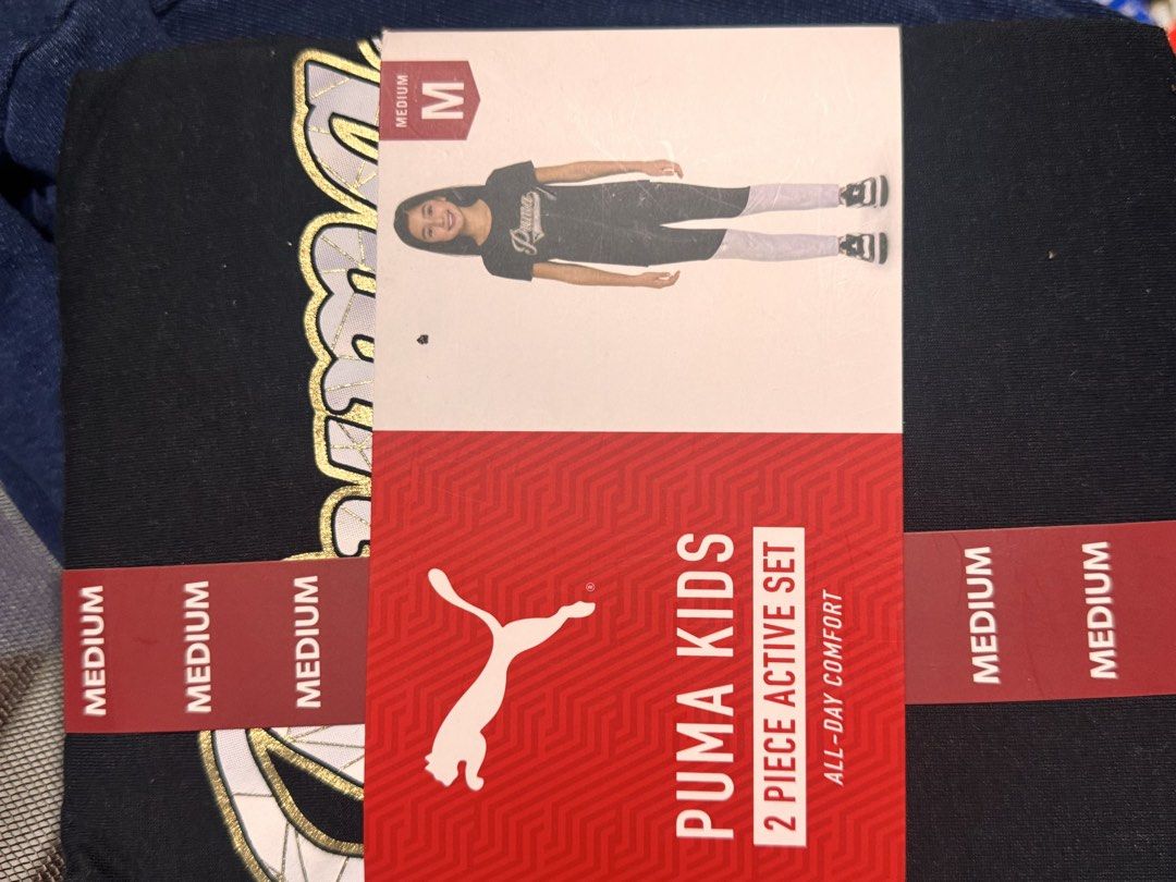 Puma Girls 2 Piece Active Set Top & Legging Medium (Category: Activewear) located in Obando. Submitted by Wintermelonzzzz (Listing ID 1461234953, Image 1). Description: - Puma girls' 2-piece active set - Includes top and leggings - Size: Medium - Ideal for all-day comfort, playtime, or sports - Made in Cambodia.