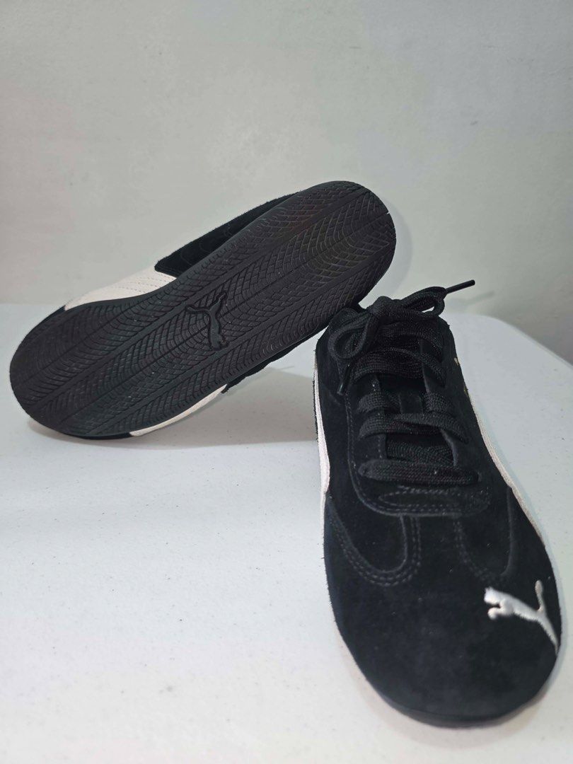 Puma Suede Shoes Black White Gold (Category: Sneakers) located in Manila. Submitted by 1b187415db4d51fa6ebf7ef43cb80c (Listing ID 1461294426, Image 3). Description: - Black Puma suede shoes - White and gold accents - Features Ortholite insoles for superior comfort - Lace-up closure for a secure fit - Ideal for casual outings or driving - Puma logo detail on side and heel.