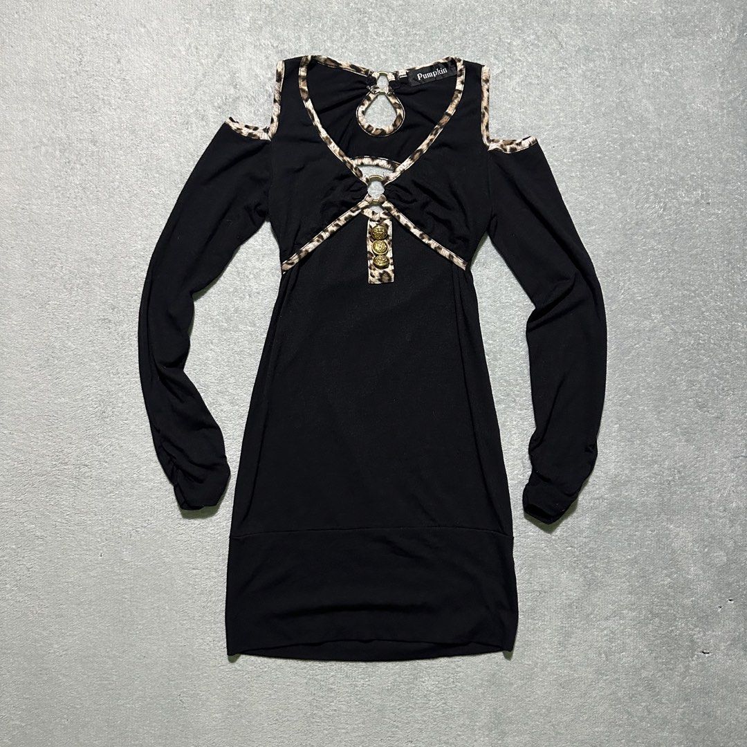 Pumpkin Black Cold Shoulder Leopard Trim Dress (Category: Dresses) located in Bayombong. Submitted by rochelle_archive_garments (Listing ID 1461322590, Image 1). Description: - Elegant black long-sleeved dress - Flattering cold shoulder cutouts - Eye-catching leopard print trim on neckline and cutouts - Front keyhole detail with gold rings and decorative buttons - Comfortable fabric with stretch - Ideal for a stylish night out.