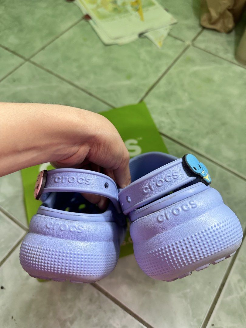 Purple Crocs with Charms (Category: Slippers and slides) located in Tuguegarao City. Submitted by oddphoenix_e9d6d4 (Listing ID 1461129483, Image 3). Description: - 100% OG (Kuwait Bought) - Light purple Crocs - Adorable charms included - Easy slip-on and off design - Ideal for casual everyday wear - Comes with a complimentary green Crocs bag.