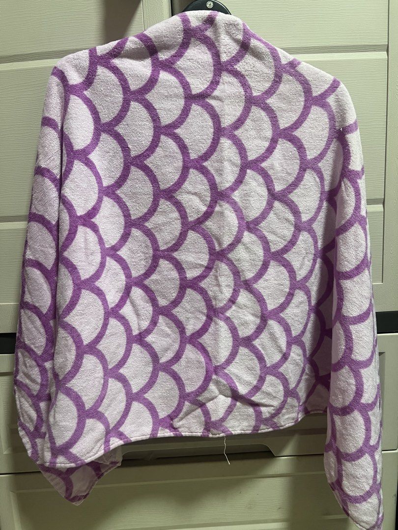 Purple Mermaid Scale Pattern Towel for kids (Category: Bedding & Towels) located in Cainta. Submitted by p3spreloved (Listing ID 1461284554, Image 1). Description: - Adorable purple towel with a unique mermaid scale pattern. - Super soft and highly absorbent material. - Ideal for beach days or cozy bath times. - Dimensions: Approximately 24in x 44in.