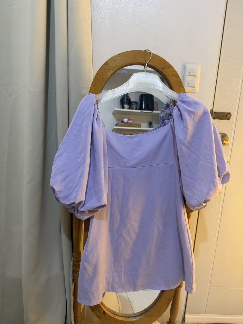 Purple Puff Sleeve Square Neck Top (Category: Blouses) located in Mandaluyong City. Submitted by chocofudge__ (Listing ID 1461153984, Image 1). Description: - Cute purple top with stylish puff sleeves - Flattering square neckline - Best fits size Small to Medium - Perfect for dressing up or down - Easily pairs with jeans or skirts - Selling because it no longer fits.