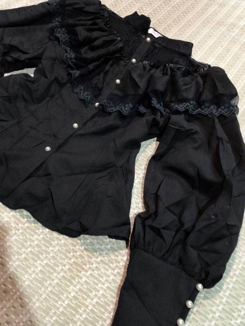 QUEENS Gothic Lolita top (Category: Longsleeves) located in Cebu City. Submitted by jny2k_thrifts (Listing ID 1461243820, Image 3). Description: black Victorian-style long-sleeve blouse featuring a ruffled collar and pearl-accented buttons..
