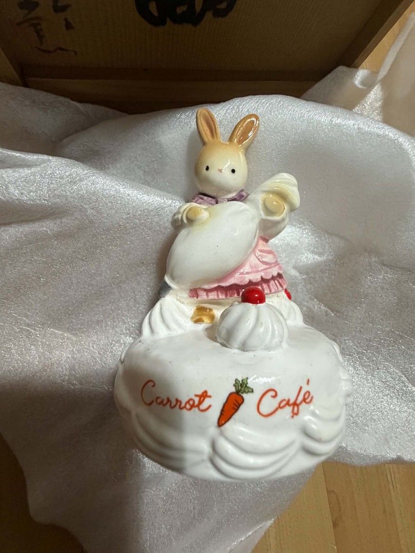 rabbit figurine music box (Category: Designer & Blind Box Toys) located in Abucay. Submitted by garuj (Listing ID 1461258319, Image 2). Description: rabbit on a cake figurine rotates with music by sekiguchi includes sliding lid wood box.