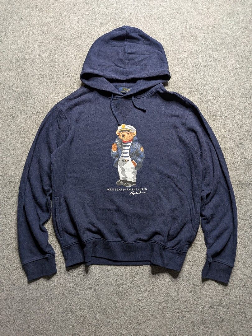 Ralph Lauren Bear Hoodie (Category: Hoodies) located in Paniqui. Submitted by fndrs.kprs.ph (Listing ID 1461120311, Image 1). Description: Ralph Lauren Polo Bear Size on tag: Medium 23x26 Color rate: 9/10 Good Condition Sign of usage Issue: Nail hole sa hoodie pero Hindi tagusan.