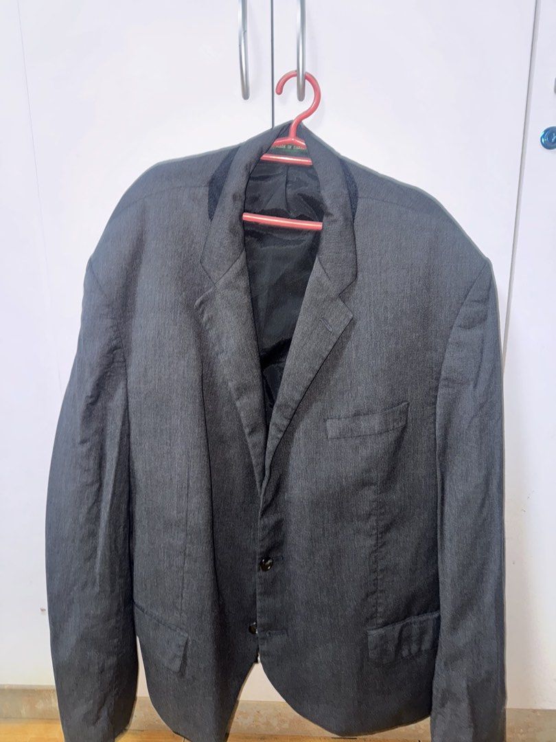 Ralph Lauren Men's Grey Blazer (Category: Coats, Jackets and Outerwear) located in Manila. Submitted by quintessesommerset (Listing ID 1461307219, Image 1). Description: - Brand: Lauren Ralph Lauren 23.5x28 - Material: Wool - Style: Classic single-breasted, two-button blazer - Pockets: Chest pocket, two front flap pockets - Interior: Fully lined - Occasion: Ideal for formal or smart casual wear.