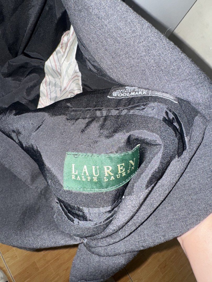 Ralph Lauren Men's Grey Blazer (Category: Coats, Jackets and Outerwear) located in Manila. Submitted by quintessesommerset (Listing ID 1461307219, Image 3). Description: - Brand: Lauren Ralph Lauren 23.5x28 - Material: Wool - Style: Classic single-breasted, two-button blazer - Pockets: Chest pocket, two front flap pockets - Interior: Fully lined - Occasion: Ideal for formal or smart casual wear.