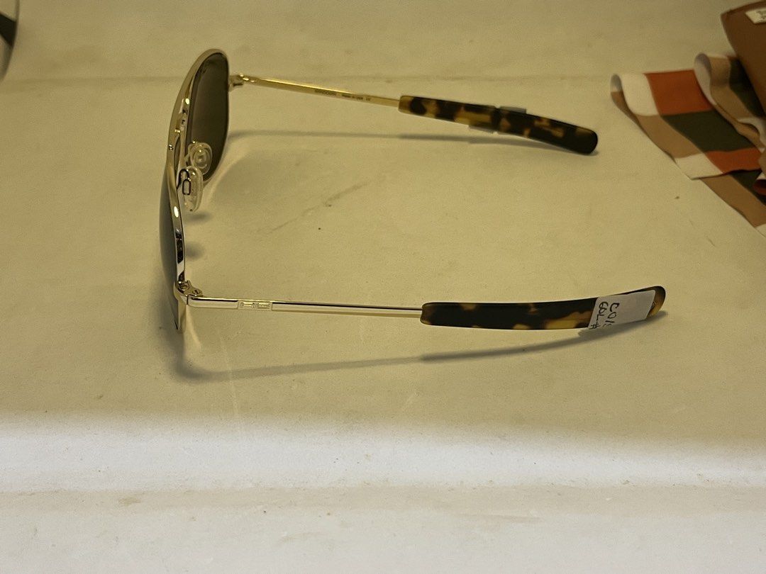Randolph Aviator Sunglasses with Case and Cloth (Category: Sunglasses & Eyewear) located in Santa Rosa. Submitted by nightviper078 (Listing ID 1461122113, Image 3). Description: - Classic Randolph aviator sunglasses - Gold frame with blue lenses - Tortoiseshell temple tips - Includes original brown leather case - Includes original cleaning cloth - Made in USA - Great for everyday wear with case and cloth brand new without box size 57 gold.