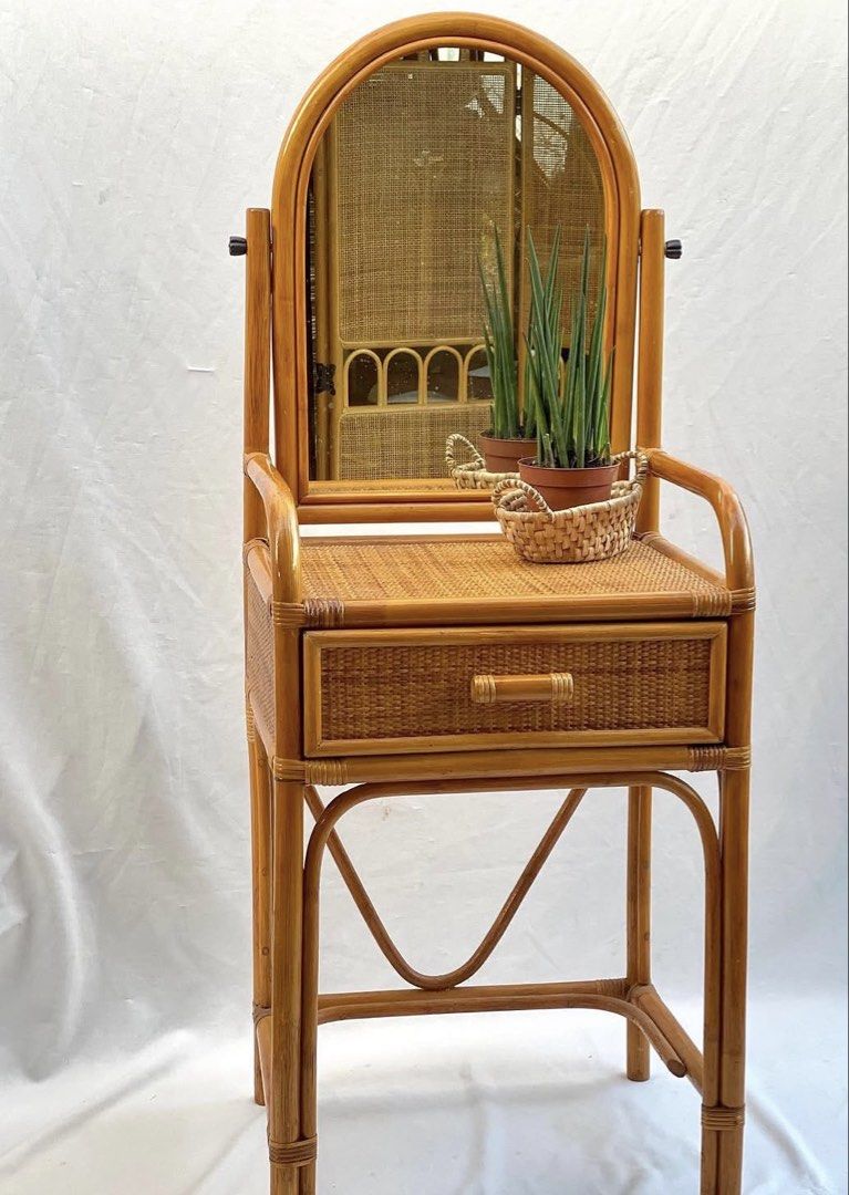Rattan Vanity Table with Mirror and Drawer (Category: Tables & Sets) located in Makati City. Submitted by u.4.ria (Listing ID 1461156268, Image 2). Description: - Vintage rattan vanity table - newly installed adjustable mirror - Includes a single storage drawer - Natural, rattan aesthetic - Ideal for bedrooms or dressing areas - Versatile for makeup or as a small desk.