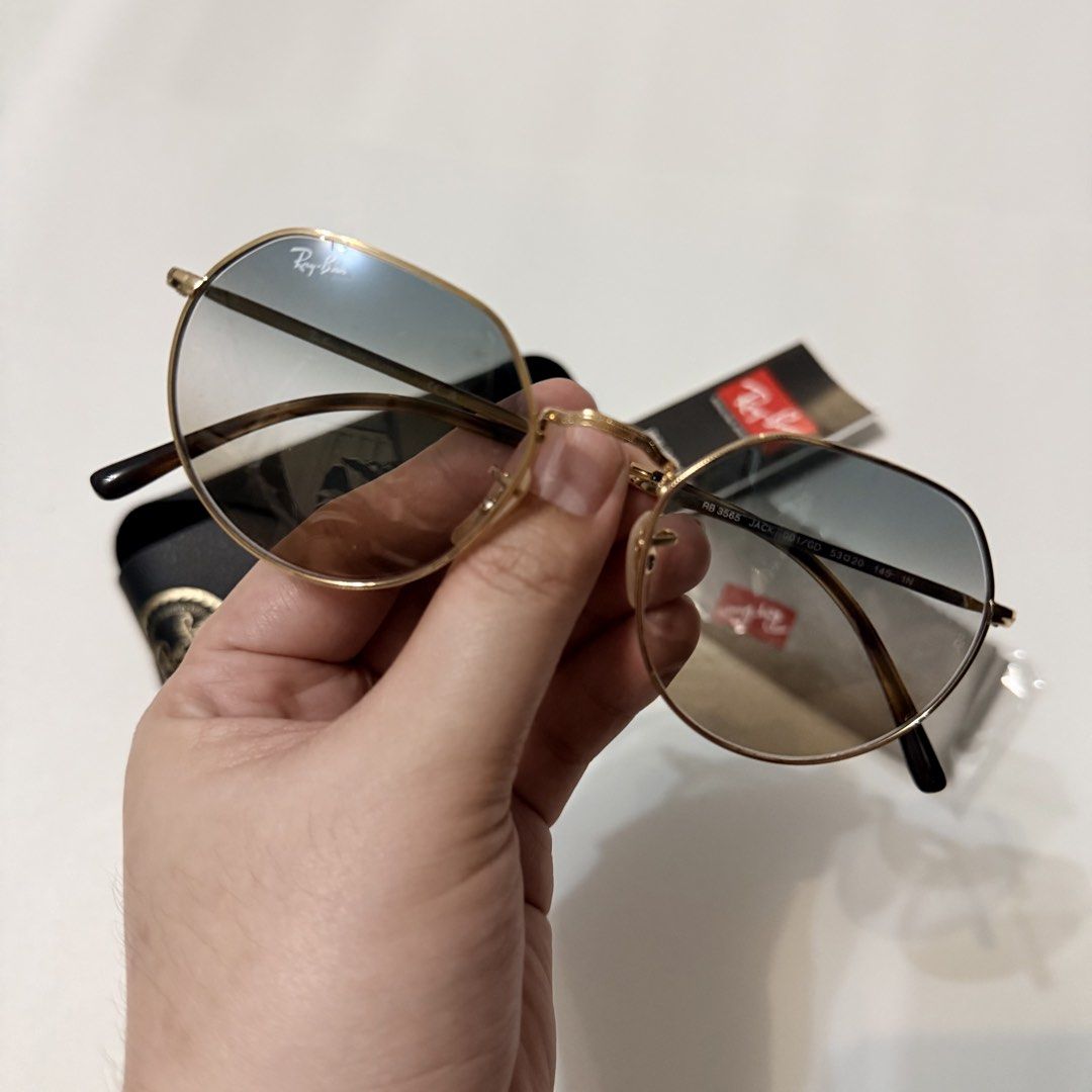 Ray-Ban Jack Geometric Frame Sunglasses (Category: Sunglasses & Eyewear) located in Angeles City. Submitted by a.k.onlineshopp (Listing ID 1461227371, Image 2). Description: - Authentic Ray-Ban hexagonal sunglasses - Gold metal frame - Gradient lenses - Includes original case - Includes original cleaning cloth - Includes authenticity booklet - Perfect for everyday wear or as a stylish accessory.