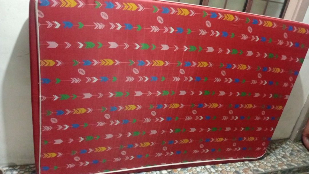 Red Arrow Pattern Mattress (Category: Bed Frames & Mattresses) located in Cavite. Submitted by xto545 (Listing ID 1461241143, Image 1). Description: - Red single mattress - Fun arrow pattern - White piping along edges - Ideal for single or child's bed - Still in good shape.