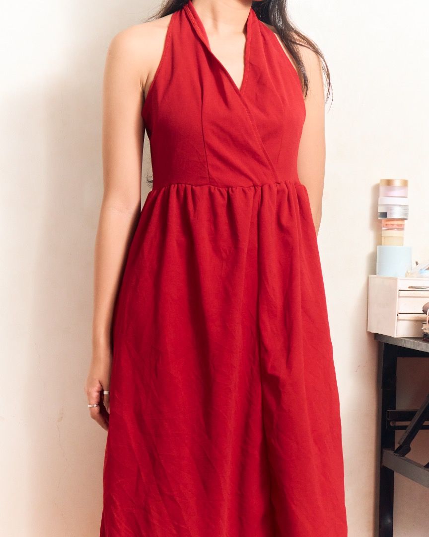 Red Halter Neck Midi Dress (Category: Dresses) located in Manila. Submitted by missalmon (Listing ID 1461250759, Image 1). Description: L: 42 inches W: 18 inches Vneck - Halter at the back Sleeveless Below the knee.