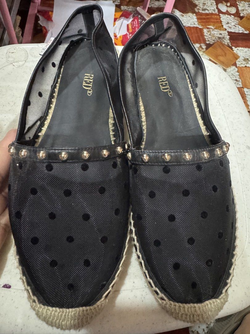 RED Valentino Made Spain (Category: Flats & Sandals) located in Manila. Submitted by wildbear.e10374 (Listing ID 1461192761, Image 1). Description: - Stylish black mesh espadrille flats - Features a cute polka dot pattern - Accented with gold studs around the trim - Easy slip-on style for comfort - Jute espadrille detail on the sole - Ideal for casual everyday wear.