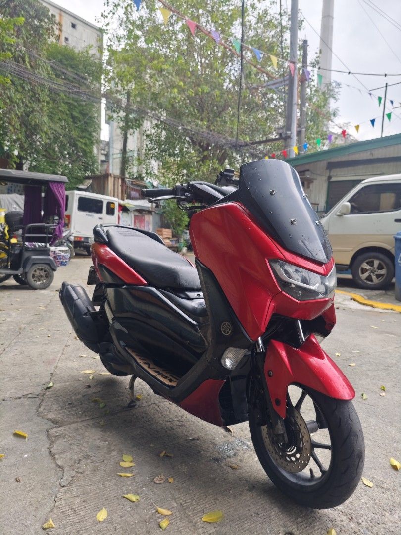 Red Yamaha NMAX 155cc Scooter (Category: Motorbikes for Sale) located in San Juan City. Submitted by epicwhale-d11f (Listing ID 1461256799, Image 2). Description: For sale rushh 82k Nmax v2 2021 model Complete all original papers Open dead of sale 29k odometer Newly registered All stock Plaka available Newly change oil Newly cvt cleaning Loud horn Abs converted to non abs Issue Check engine di nagana speedo meter tapos mga dents . Loc paco manila