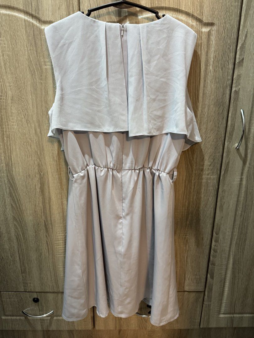 Redefine Dress (Category: Dresses) located in Calamba. Submitted by nicalison (Listing ID 1461255132, Image 2). Description: - Grey dress from Rodeo Show - Cap sleeves with layered overlay - Elasticated waist at the back - Knee length - Zipper closure at the back - Ideal for events or work.