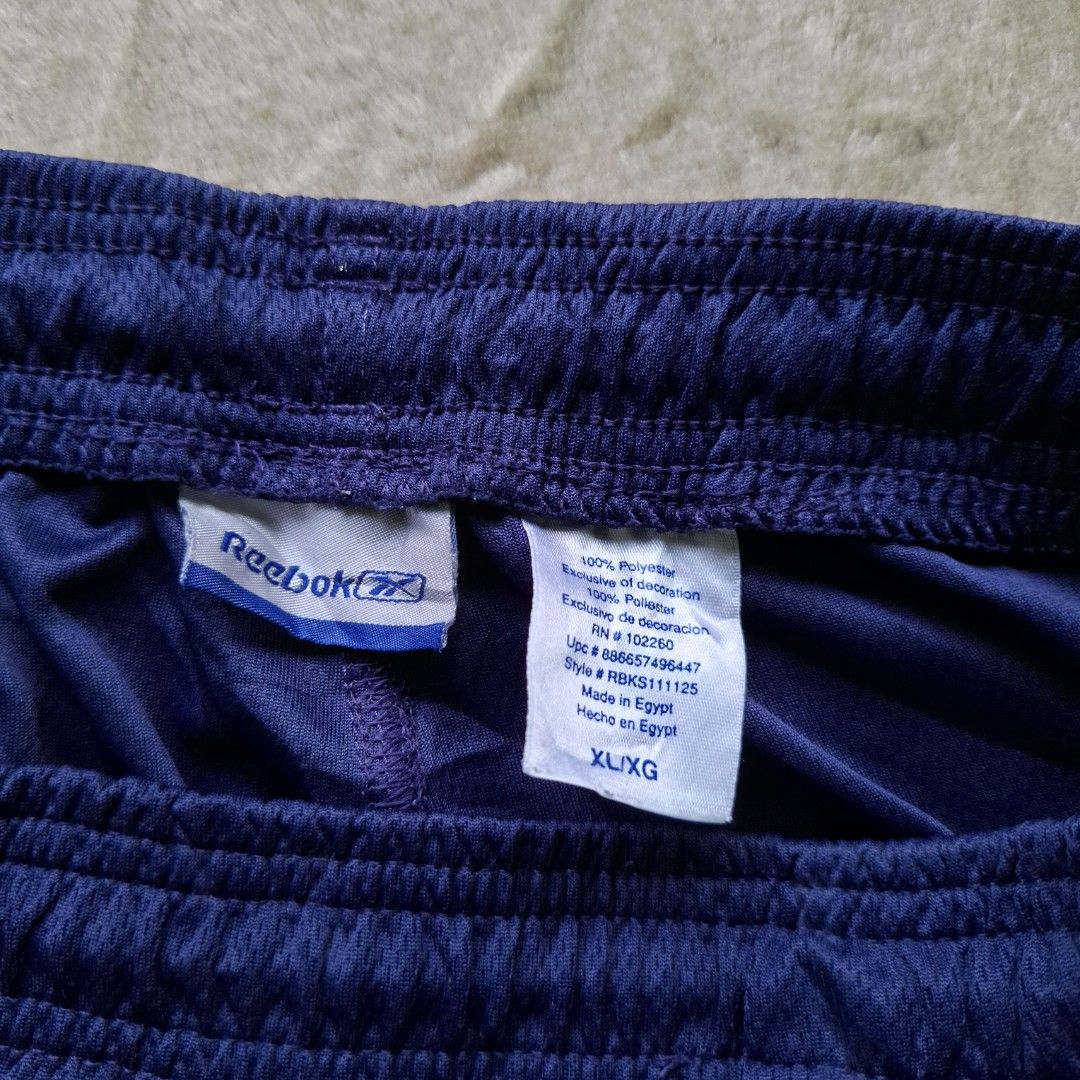 Reebok Navy Blue Athletic Shorts XL (Category: Shorts) located in Alaminos. Submitted by made.by (Listing ID 1461258202, Image 3). Description: ​Waist: 17" (Laid Flat, stretchable up to 19-20") / Fits 34" - 38" waist ​Length: 17.5" ​Leg Opening: 14" ​Tag Size: XL / XG ​Condition: Good condition.