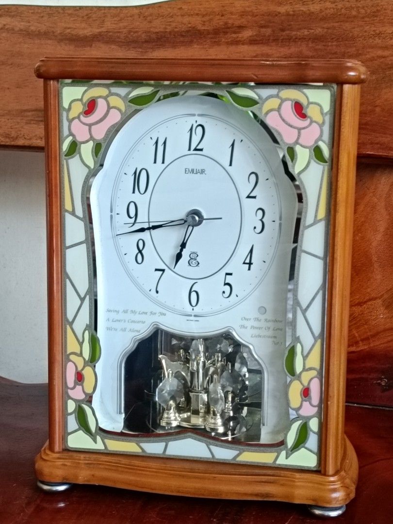 Rhythm EMUAIR Musical Mantel Clock, Working (Category: Clocks) located in Imus. Submitted by ABrielleC (Listing ID 1461323115, Image 1). Description: Video Link https://youtube.com/shorts/3A_61QRYupA?si=O1DuUGDc_YVf7jSO Good Running Condition With Melody Every Hour (6 Melody) Night Auto Shut Off (for Melody) Switch On/Off (for Melody) Battery- Size C(2x) & AA(3x) Volume Controller Wooden Frame Made in Japan Height-12.5in Length-9in Width4.5in Wei