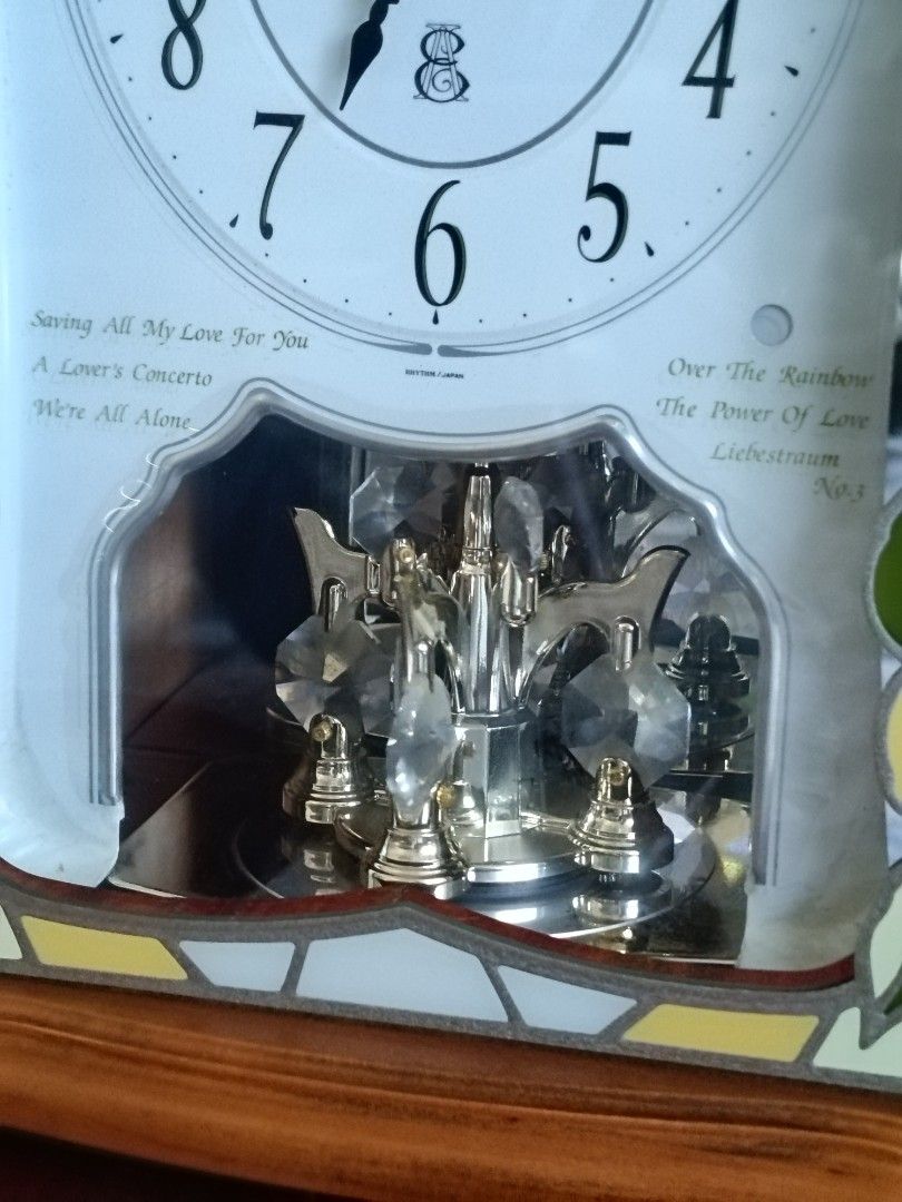 Rhythm EMUAIR Musical Mantel Clock, Working (Category: Clocks) located in Imus. Submitted by ABrielleC (Listing ID 1461323115, Image 3). Description: Video Link https://youtube.com/shorts/3A_61QRYupA?si=O1DuUGDc_YVf7jSO Good Running Condition With Melody Every Hour (6 Melody) Night Auto Shut Off (for Melody) Switch On/Off (for Melody) Battery- Size C(2x) & AA(3x) Volume Controller Wooden Frame Made in Japan Height-12.5in Length-9in Width4.5in Wei