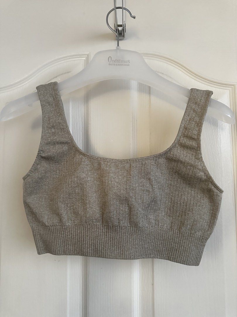 Ribbed Grey Sports Bra (Category: Activewear) located in Manila. Submitted by nfcloset_ (Listing ID 1461187157, Image 3). Description: - Grey ribbed sports bra - Comfortable and stretchy material - Flattering scoop neck design - Ideal for workouts, gym sessions, or casual wear - Versatile: pairs easily with leggings or shorts.