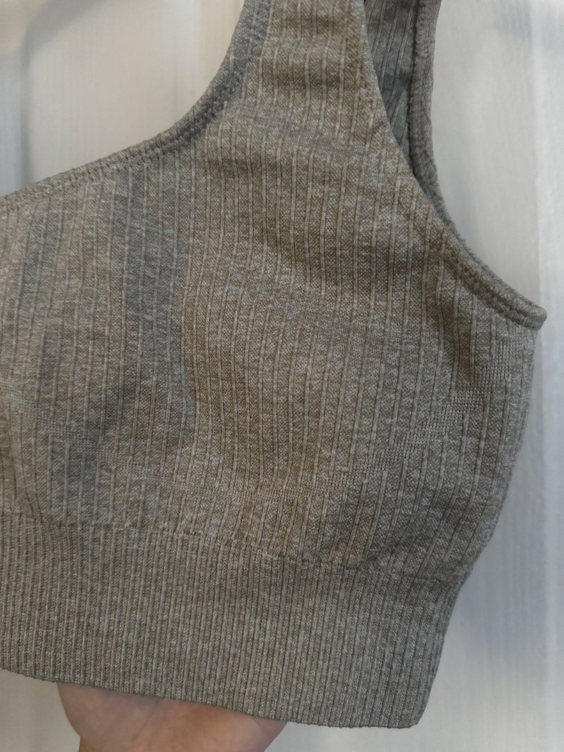 Ribbed Grey Sports Bra (Category: Activewear) located in Manila. Submitted by nfcloset_ (Listing ID 1461187157, Image 2). Description: - Grey ribbed sports bra - Comfortable and stretchy material - Flattering scoop neck design - Ideal for workouts, gym sessions, or casual wear - Versatile: pairs easily with leggings or shorts.