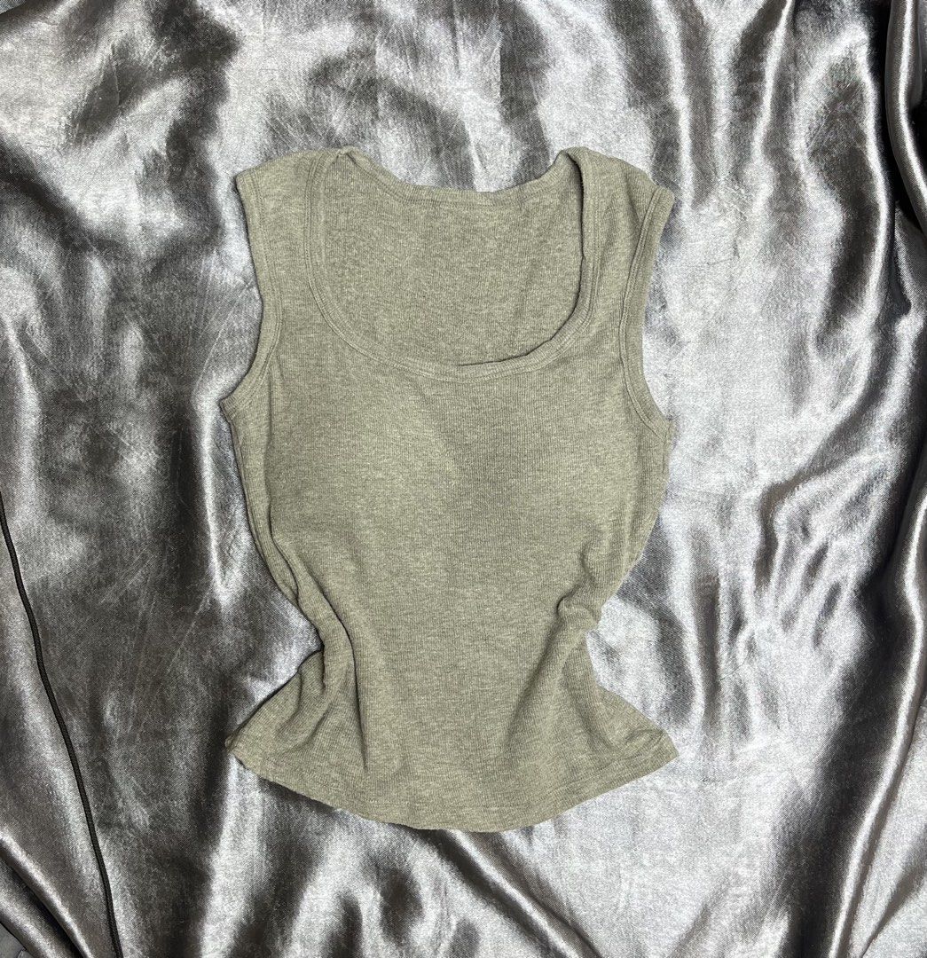 Ribbed Square Neck Sleeveless Tank Top - Gray (Category: Sleeveless) located in Cavite. Submitted by bellewii (Listing ID 1461225125, Image 1). Description: - Olive green ribbed tank top - Flattering square neckline - Sleeveless design - Stretchy, form-fitting material for comfort - Versatile: great for layering or wearing alone - Easy to style with jeans, skirts, or shorts.