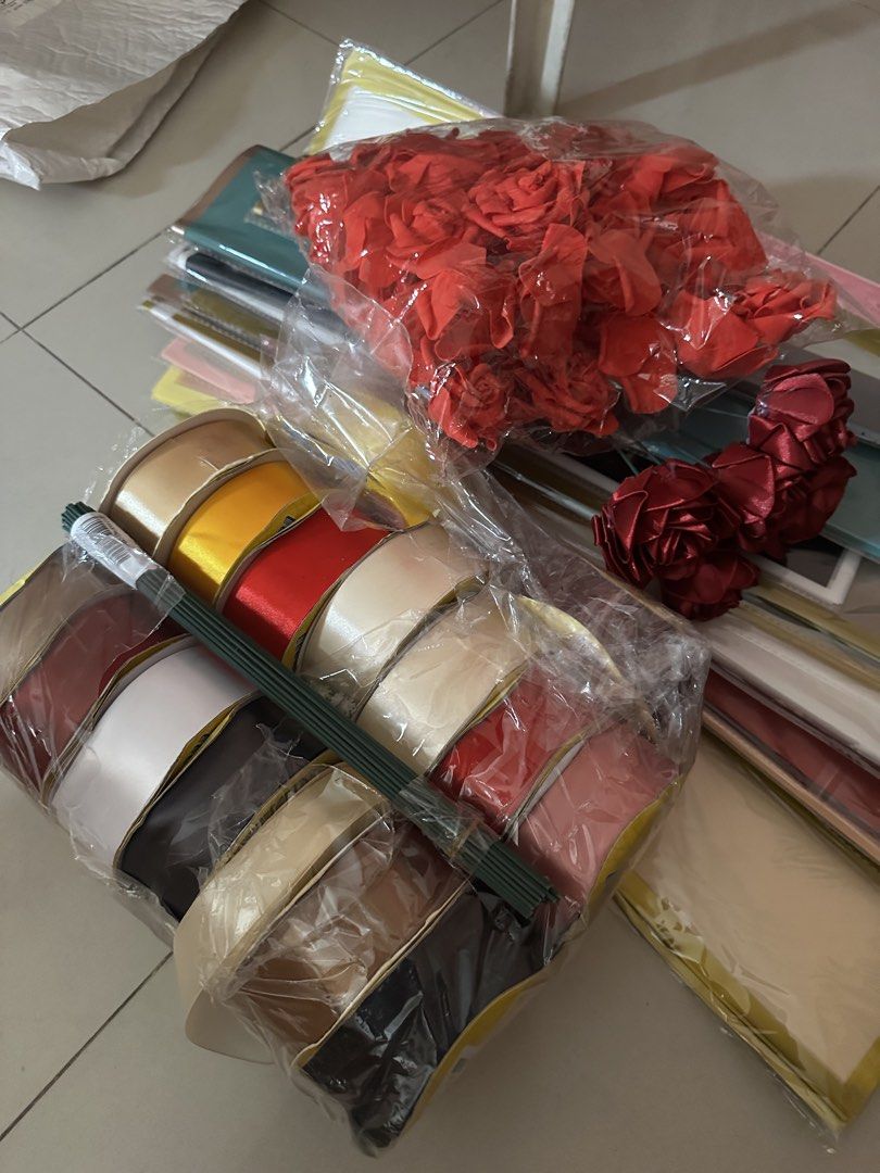 Ribbons and wrappers (Category: Flowers & Bouquets) located in Mandaluyong City. Submitted by toyheist (Listing ID 1461137589, Image 2). Description: 14 Ribbon set More than 8-9 wrapper set! Good for making flower bouquet ! With ready made artificial flowers With floral wire For only P4000 rush!!!! Mop:Gcash/cash/bank ok Delivery on buyer’s expense Loc: Mandaluyong.