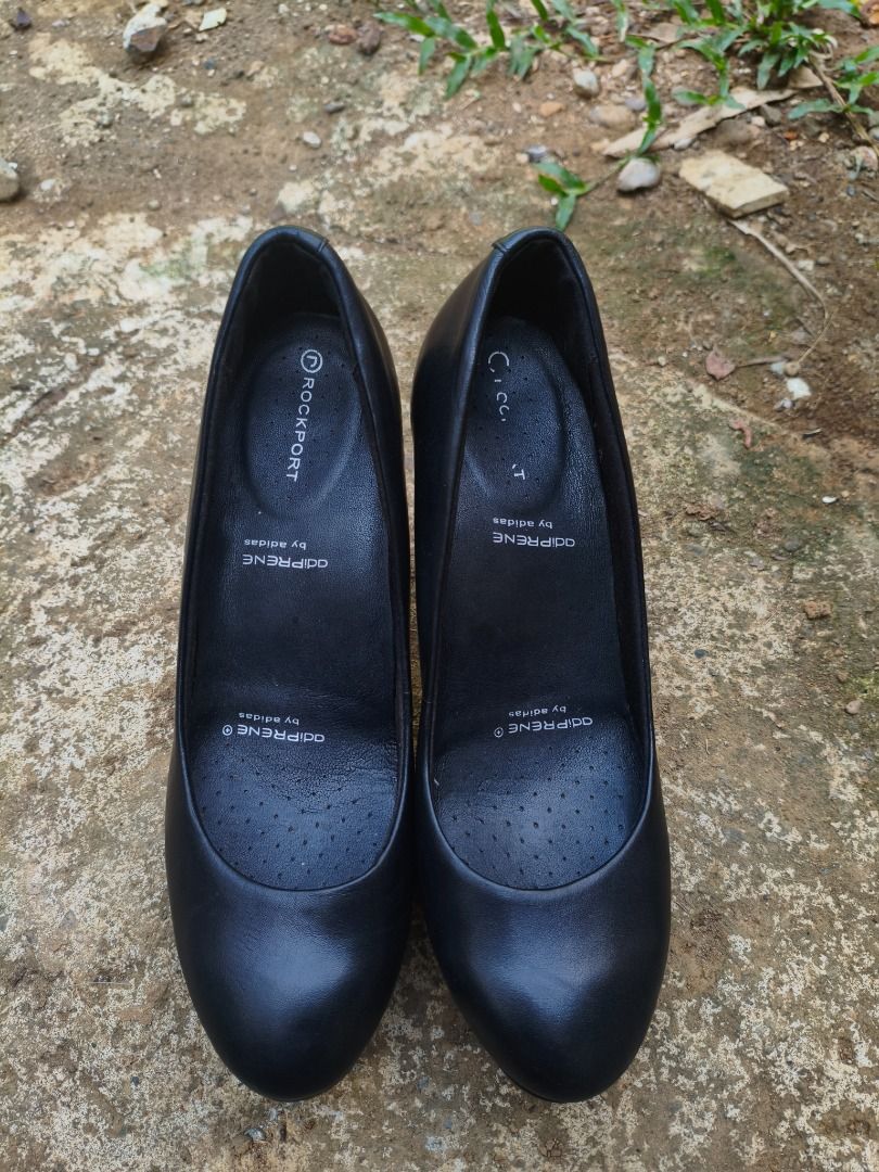 Rockport Adiprene Black Leather Heels (Category: Heels) located in Panitan. Submitted by pingpongggball (Listing ID 1461189490, Image 2). Description: - Brand: Rockport - Color: Black - Material: Leather - Features: Adiprene by Adidas cushioning for comfort - Style: Classic pump - Versatile: Suitable for work or casual wear - Size 7 - From US - Bagong bago pa - Maganda pang office/school .