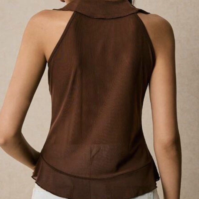 Ruffle Tie Front Mesh Halter Tops (BROWN & BLACK) (Category: Sleeveless) located in Makati City. Submitted by midnightmelhem (Listing ID 1461142137, Image 2). Description: ₱100 FOR 2 TOPS!!!! - Brown mesh halter top - Tie front detail - Ruffle accents along neckline and front - Sleeveless design - Halter neck - Sheer material.