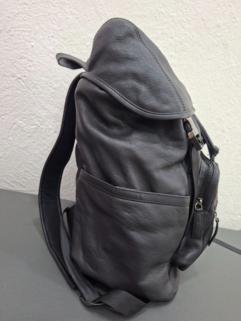 Sacoor Brothers Leather Backpack (Category: Backpacks) located in Baguio. Submitted by almostarriane (Listing ID 1461165966, Image 3). Description: - Sacoor Brothers black leather backpack - Made with 100% genuine leather - 100% polyester lining - Secure drawstring closure under flap with buckle straps - Features multiple internal pockets for organization - Ideal for everyday use or travel adventures.